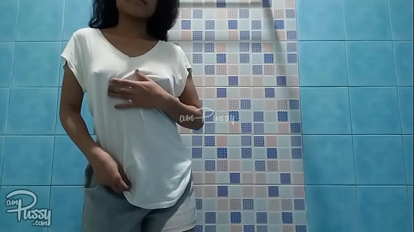 Skinny Asian chick washes her naked body in shower